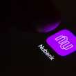 Nubank bank app on the screen.