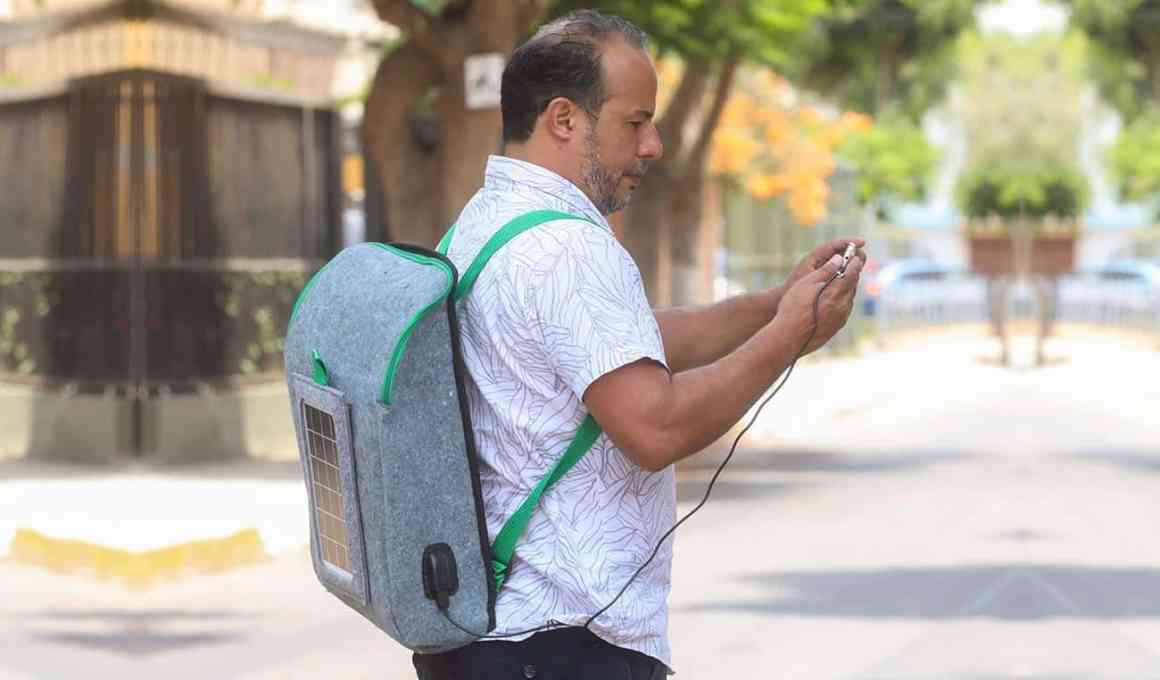 entrepreneurs create eco-friendly backpack made of recycled plastic and built-in solar panel